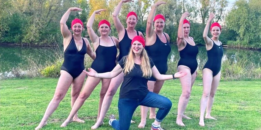 Ray Farr with the synchro swimmers on the bank, Court Farm Lakes